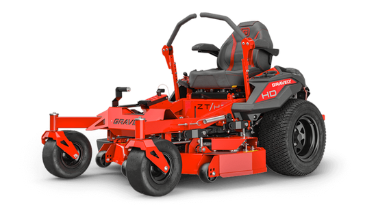 Red Gravely zero-turn lawn mower on a black background