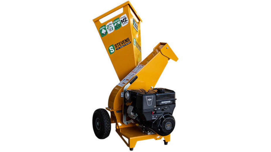 Yellow Stevens wood chipper with visible branding on a white background