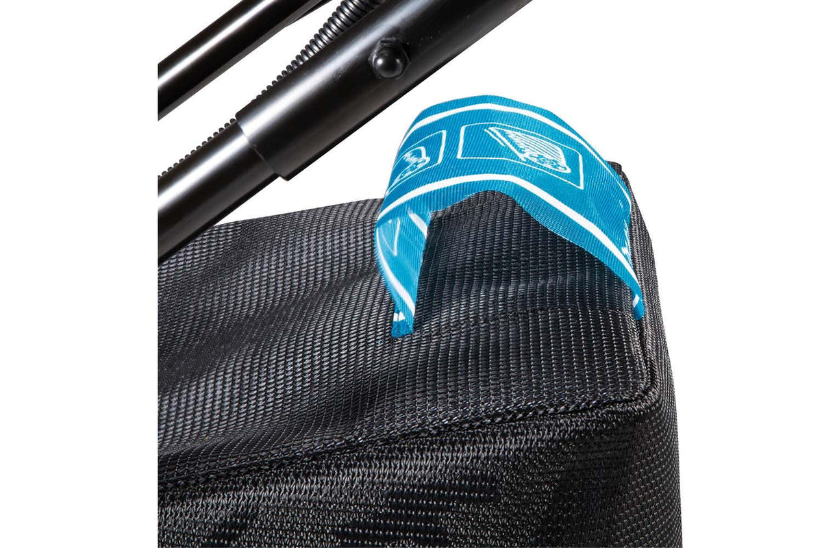 Close-up of Makita catcher a blue strap with a logo on a black mesh background