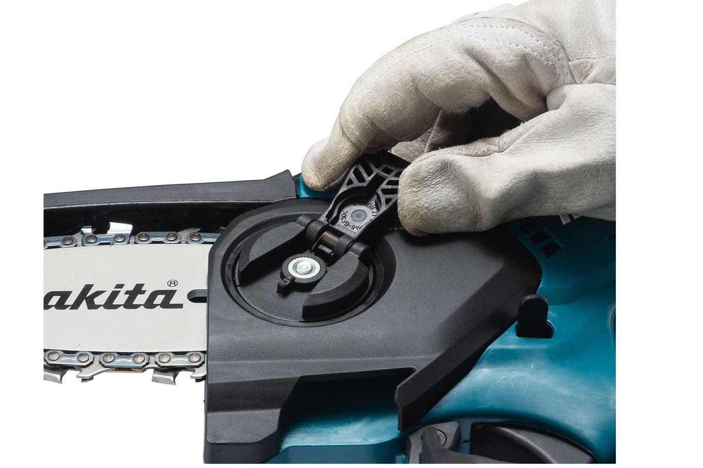 Close up shot of Makita chainsaw side cover release handle on a white background.