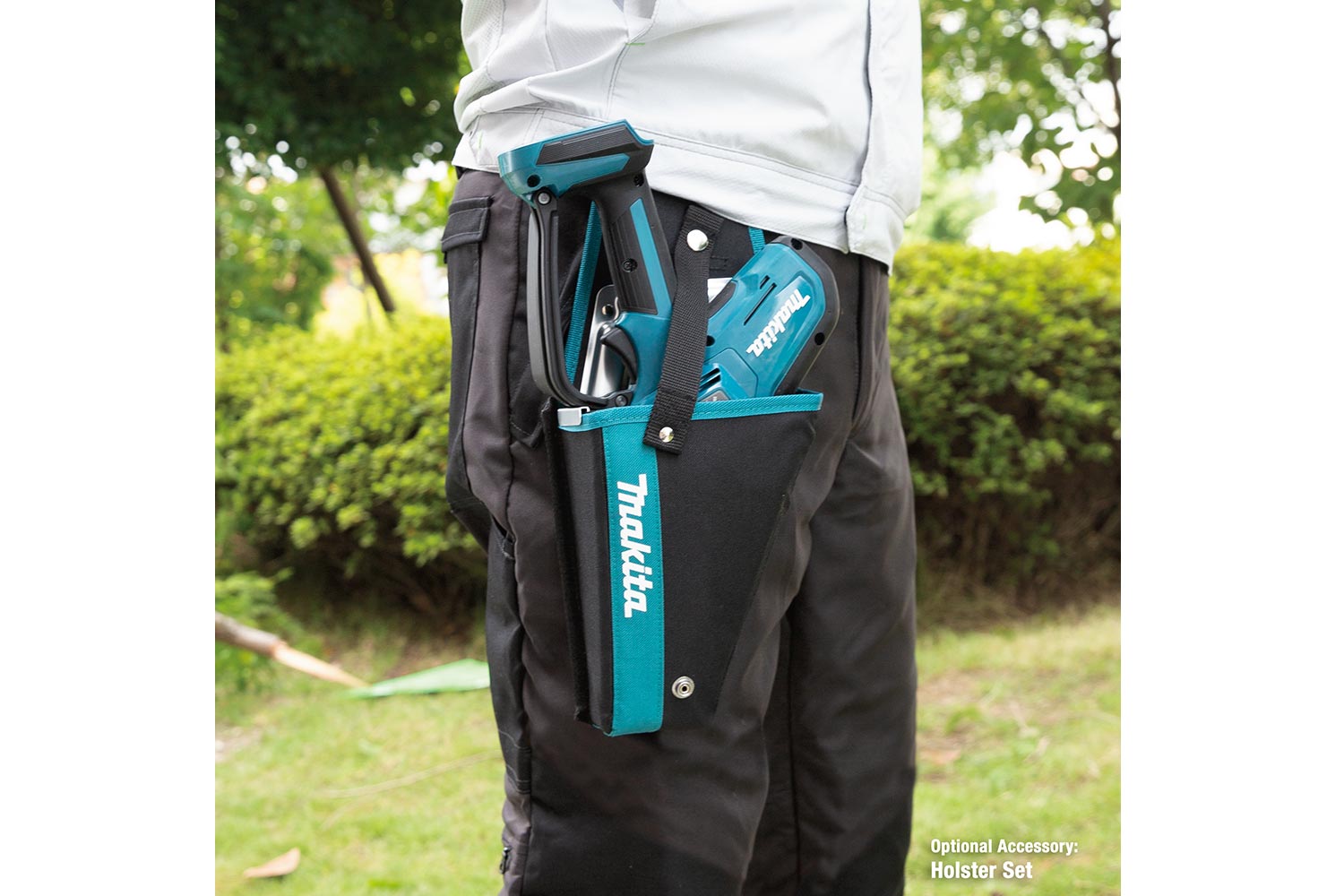 Image of person wearing a Makita holster set containing Makita pruning saw.