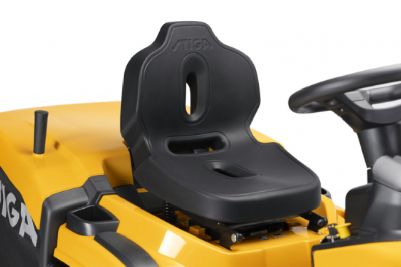 Close-up of a yellow Stiga riding lawn mower with a black seat and steering wheel on a white background.
